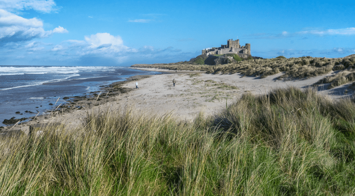 people on Bamburgh Beach
