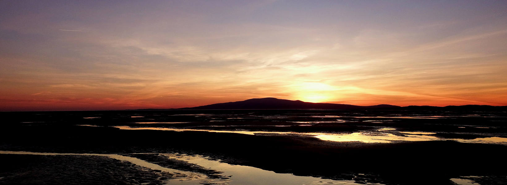 Queensberry Bay beach sunset