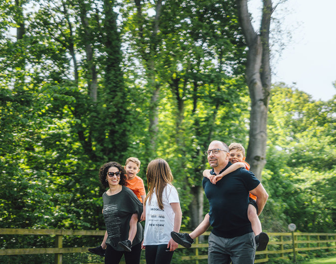 Family walking at a UK holiday park 
