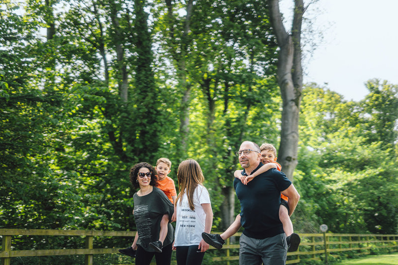 Family walking at a UK holiday park 