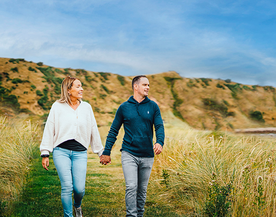 Couple walking on the beach