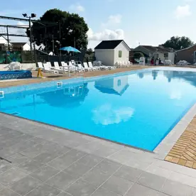 Outdoor swimming pool at Golden Coast 