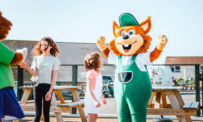 Vinnie the fox with child at Golden Coast