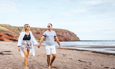Couple on Pease Bay beach